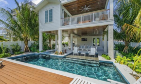 From Dusk 'Til Dune, Gorgeous 5 beds, 5,5 Baths Home on the Canal and steps away from the beach!